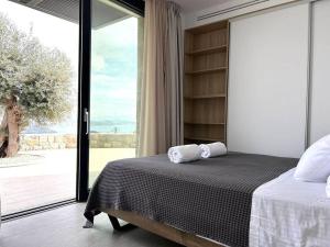 Ένα ή περισσότερα κρεβάτια σε δωμάτιο στο Go-Blue Star, Villa Sea +40 φωτογραφίες