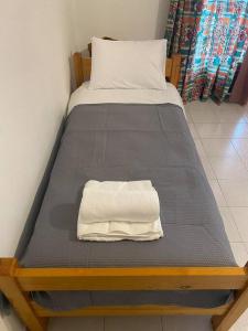Postel nebo postele na pokoji v ubytování Cozu studio MELISSI 1