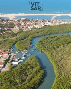 an aerial view of a river with boats in it at Casa Laranja in Cascavel