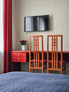 TV a/nebo společenská místnost v ubytování Muzeja apartamenti + 20 fotografií
