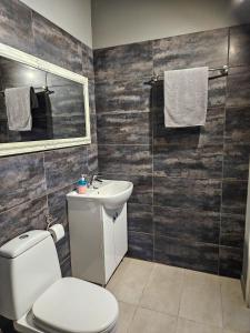 Koupelna v ubytování Muzeja apartamenti