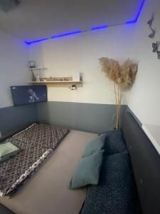 Postel nebo postele na pokoji v ubytování Studio KID