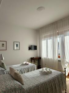 A bed or beds in a room at Lucignolo