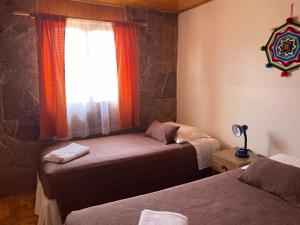 Letto o letti in una camera di Hostal Desert