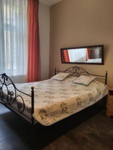 Posteľ alebo postele v izbe v ubytovaní Sunfower Prague Suites
