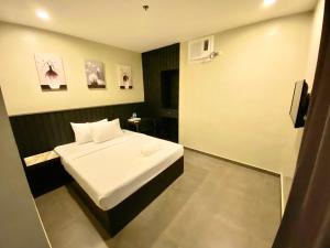 Rudolfo Suites客房内的一张或多张床位