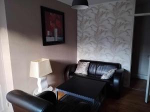 Posedenie v ubytovaní Chambre d'hote Familiale de la maison Bleue
