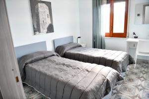 Postel nebo postele na pokoji v ubytování B&B Francesca