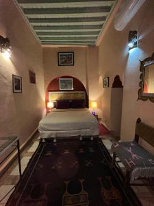 Llit o llits en una habitació de Riad N10