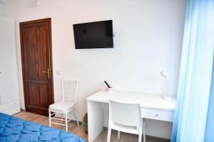TV a/nebo společenská místnost v ubytování B&B Francesca + 27 fotografií