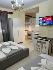 TV a/nebo společenská místnost v ubytování Sota Apartment