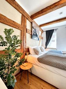 Llit o llits en una habitació de BackHome - Fantastische Lage, SmartTV, Netflix, 50qm, 24h Checkin - Apartment 4