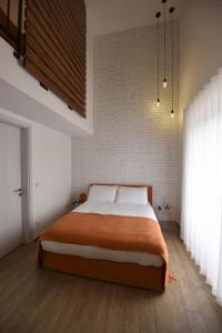 Posteľ alebo postele v izbe v ubytovaní Quaint Boutique Hotel Nadur