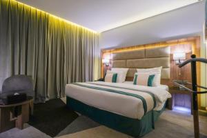 Postel nebo postele na pokoji v ubytování Rasia Hotel Jeddah