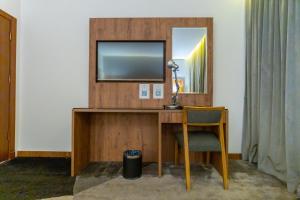 TV a/nebo společenská místnost v ubytování Rasia Hotel Jeddah