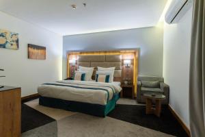 Postel nebo postele na pokoji v ubytování Rasia Hotel Jeddah