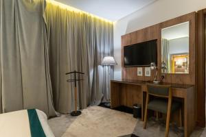 TV a/nebo společenská místnost v ubytování Rasia Hotel Jeddah