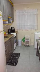 A cozinha ou cozinha compacta de Praia, Sol, luar e lazer