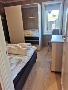 Posteľ alebo postele v izbe v ubytovaní Sentral leilighet på Geilo