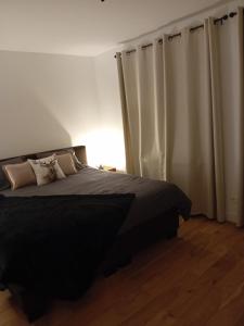 Postel nebo postele na pokoji v ubytování Ama's Sweet home