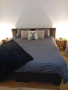 Postel nebo postele na pokoji v ubytování Ama's Sweet home