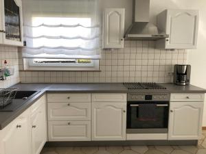 Köök või kööginurk majutusasutuses feelslikehome Apartment Nähe Stuttgart Flughafen - Messe