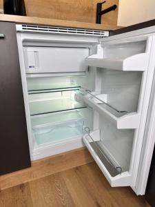 Kuchyň nebo kuchyňský kout v ubytování Grimming Lodge Tauplitz