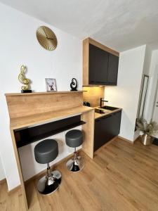 Kuchyň nebo kuchyňský kout v ubytování Grimming Lodge Tauplitz