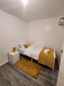Katil atau katil-katil dalam bilik di Airbnb Palace