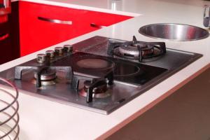 a stove top with pots and pans on it in a kitchen at @ The Lappa in Crocodile Valley Estates