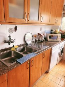 Dapur atau dapur kecil di Apartamento com boa localização e Conforto