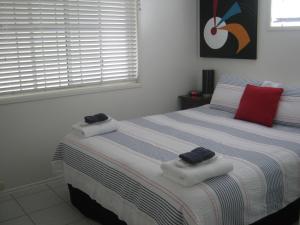 Postel nebo postele na pokoji v ubytování Campwin Beach House