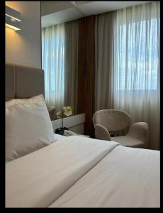 Кровать или кровати в номере QUARTO DUPLO - Suíte