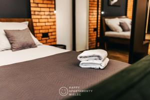 Posteľ alebo postele v izbe v ubytovaní Happy Nest - ApartamentyHappy pl