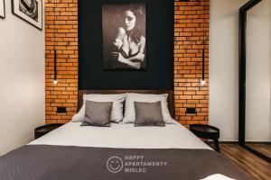 Posteľ alebo postele v izbe v ubytovaní Happy Nest - ApartamentyHappy pl