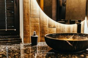 Kúpeľňa v ubytovaní Happy Nest - ApartamentyHappy pl