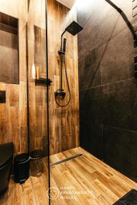 Kúpeľňa v ubytovaní Happy Nest - ApartamentyHappy pl