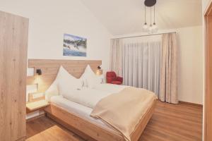 Postel nebo postele na pokoji v ubytování Landgasthaus Zollerstuben