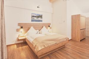 Postel nebo postele na pokoji v ubytování Landgasthaus Zollerstuben