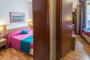 Posteľ alebo postele v izbe v ubytovaní Hotel Il Moro di Venezia