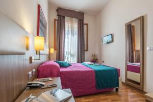 Posteľ alebo postele v izbe v ubytovaní Hotel Il Moro di Venezia