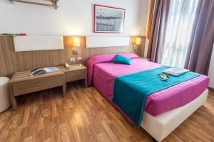 Posteľ alebo postele v izbe v ubytovaní Hotel Il Moro di Venezia