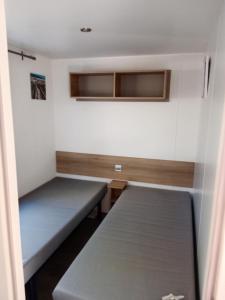 Posteľ alebo postele v izbe v ubytovaní Domaine de Kerlann