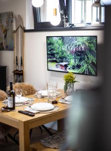 Televízia a/alebo spoločenská miestnosť v ubytovaní VILLETTA Apartmán