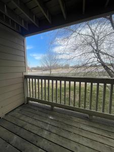 a porch view from the back of a house at Cute & Cozy Suite in Overland Park in Overland Park