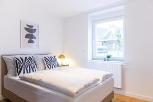 Voodi või voodid majutusasutuse living TIMELESS - Adler Apartments Sasbachwalden toas