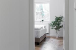 Voodi või voodid majutusasutuse living TIMELESS - Adler Apartments Sasbachwalden toas