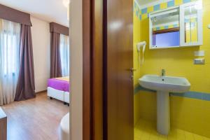 Ett badrum på Hotel Il Moro di Venezia
