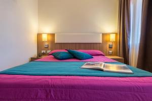 Posteľ alebo postele v izbe v ubytovaní Hotel Il Moro di Venezia
