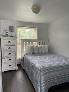 En eller flere senge i et værelse på The Grand Beach Inn + 118 billeder